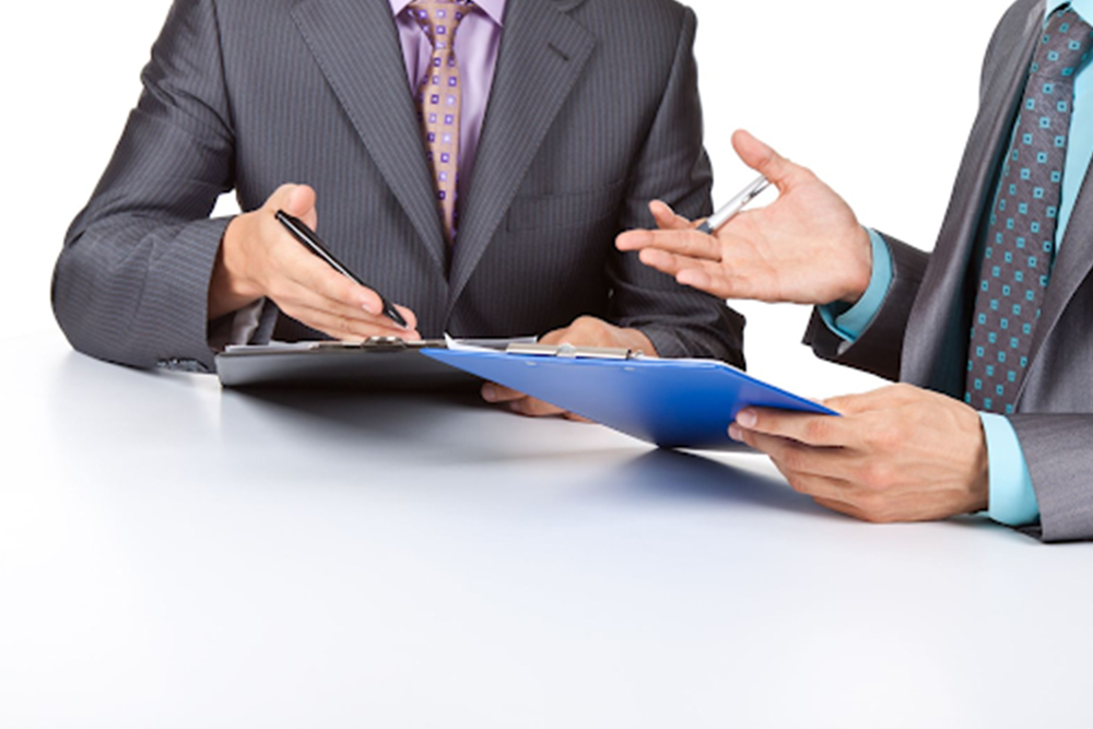 Employee discussing workplace concerns with an employment lawyer